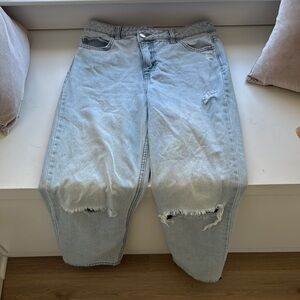 Distressed Light Wash Denim Jeans